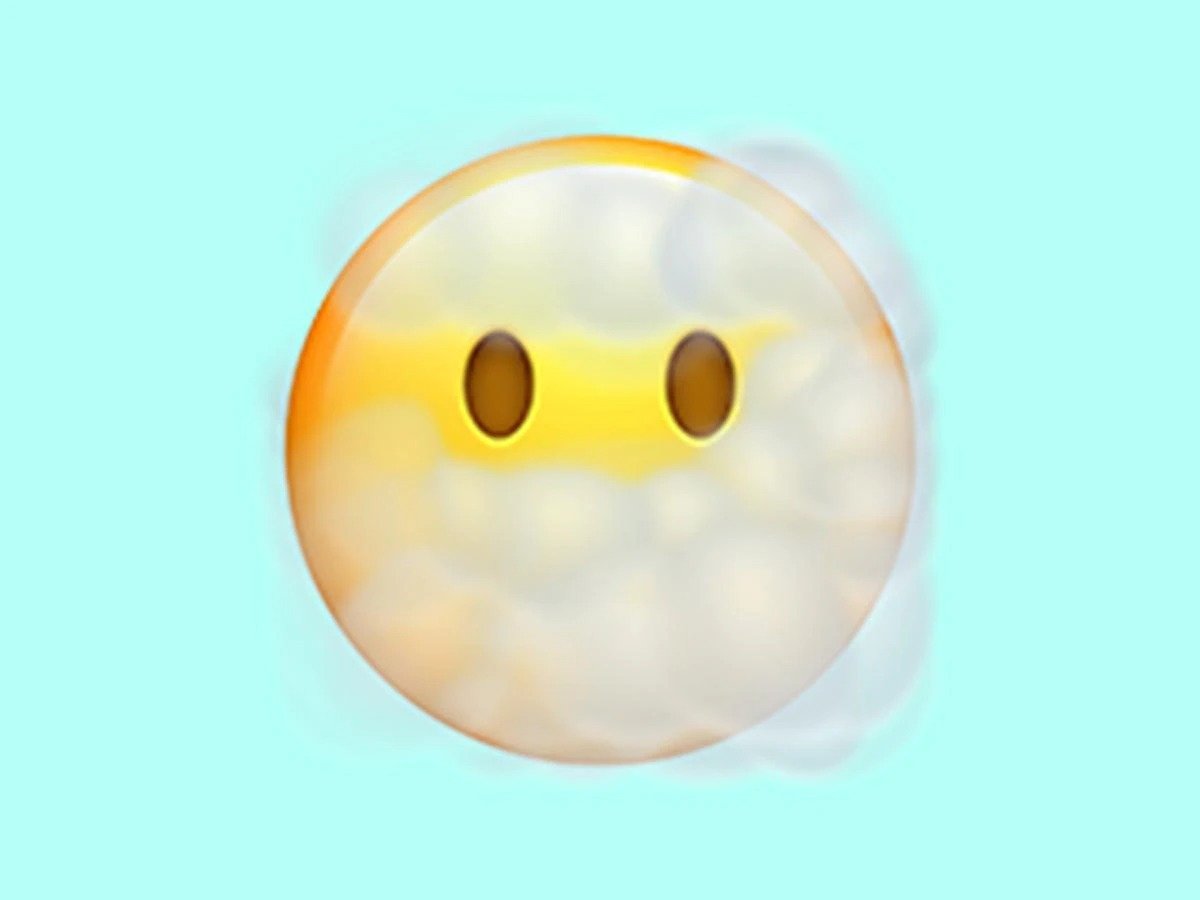 Descobrimos o real significado do emoji do rosto coberto por nuvens no WhatsApp