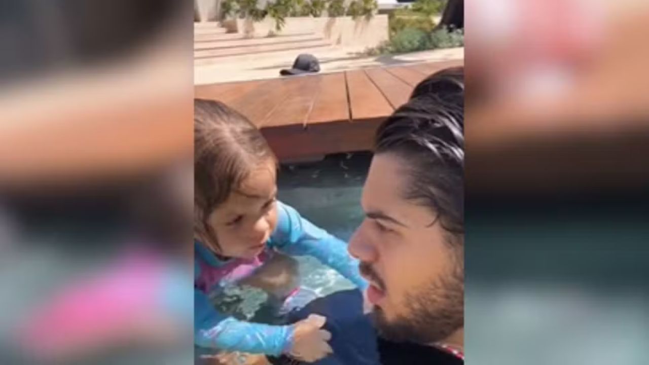 Cantor Zé Felipe entra na piscina para salva filha. (Foto: Reprodução/ Redes sociais)