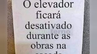 Placa colocada em prédio chama atenção e deixa moradores confusos