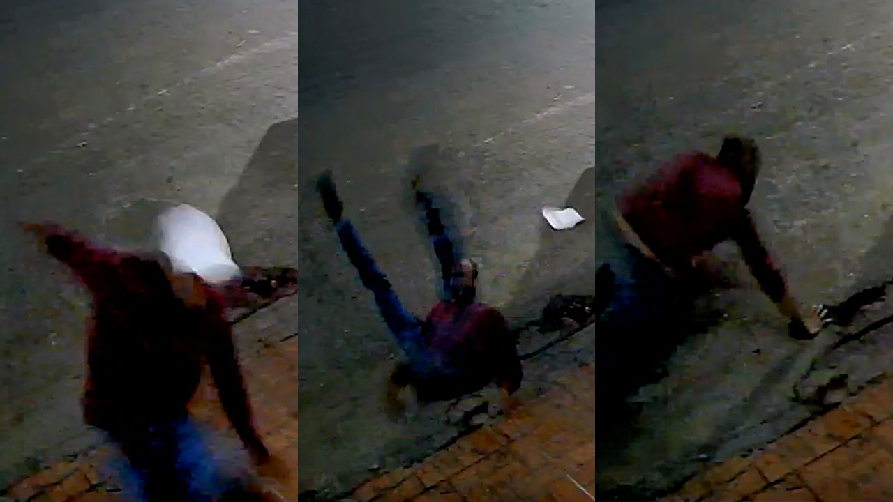 Homem levou tombo ao tentar dar chute no portão. (Foto: Reprodução)