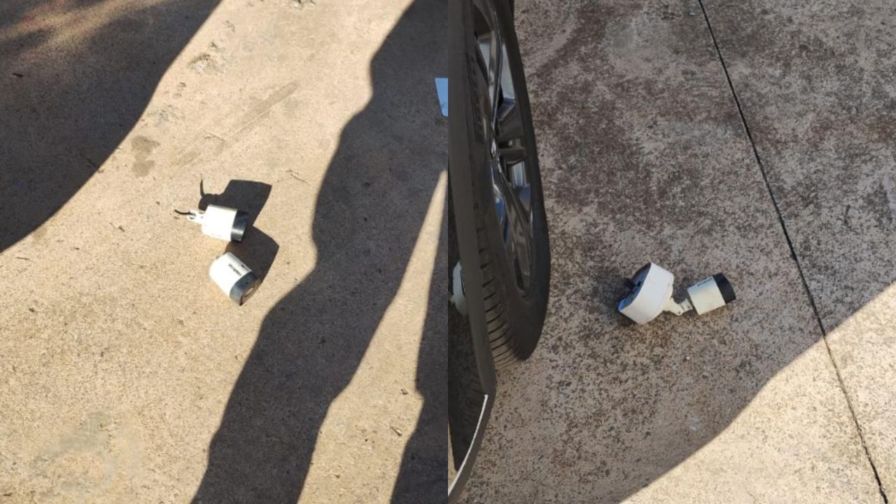Câmeras da concessionária foram encontradas no chão. (Foto: Reprodução)