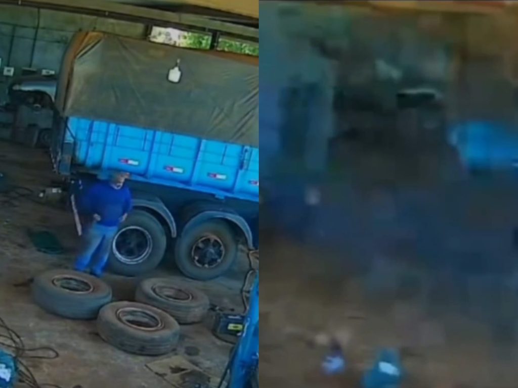 Câmeras registraram momento em que pneu explodiu na borracharia. (Foto: Reprodução)