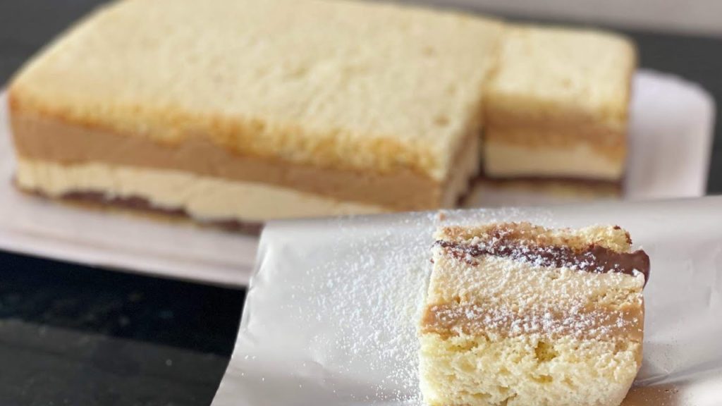 Bolo de coco com brigadeiro de doce de leite: fica molhadinho e bem recheado