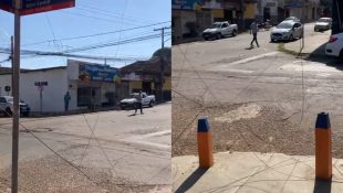 Registro da fiação caída em meio à rua. (Foto: Reprodução)