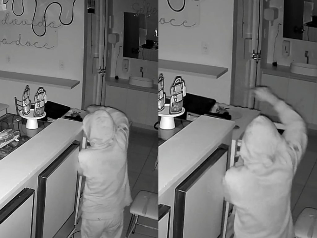 Câmeras da confeitaria registraram o momento do furto. (Foto: Reprodução)