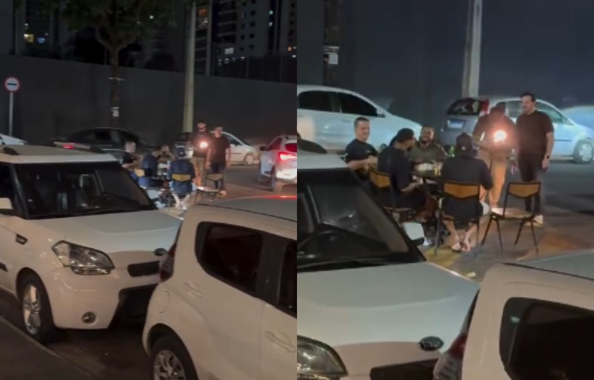 Vídeo viraliza ao mostrar grupo tocando pagode em mesa montada no meio de cruzamento em Anápolis