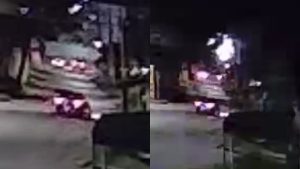 Câmera mostra quando tiroteio acontece e motorista colide com poste.