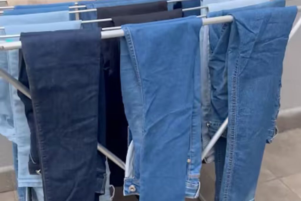 forma correta de estender calça jeans