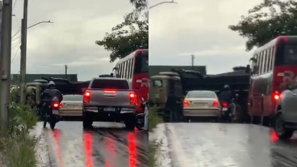 Motoristas e motociclistas precisam desviar para não bater nos caminhões estacionados.
