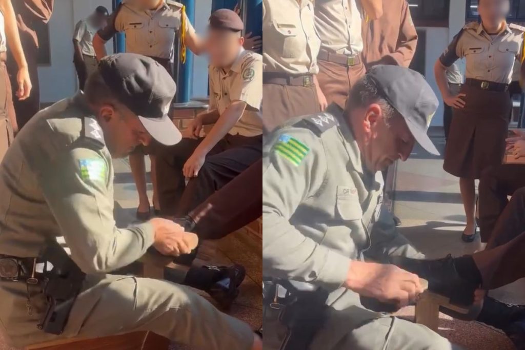 Capitão da PM engraxando sapato