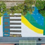 Alunos de colégio de Anápolis resgatam tradição e pintam rua para a Copa do Mundo