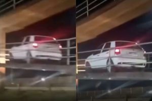 Cena inusitada: carro fica preso ao tentar passar por passarela sobre a BR-060