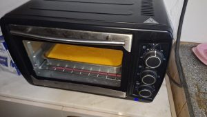 abrir a porta do forno