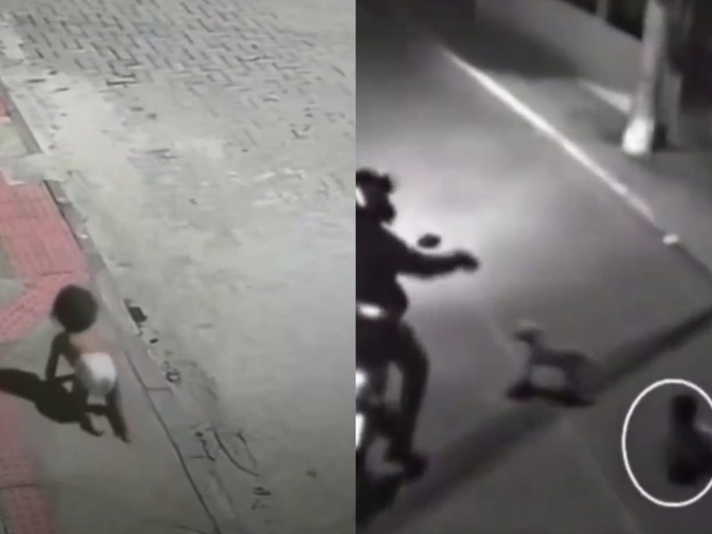 Bebê engatinhando sozinha na rua é salva por motoqueiro no ES