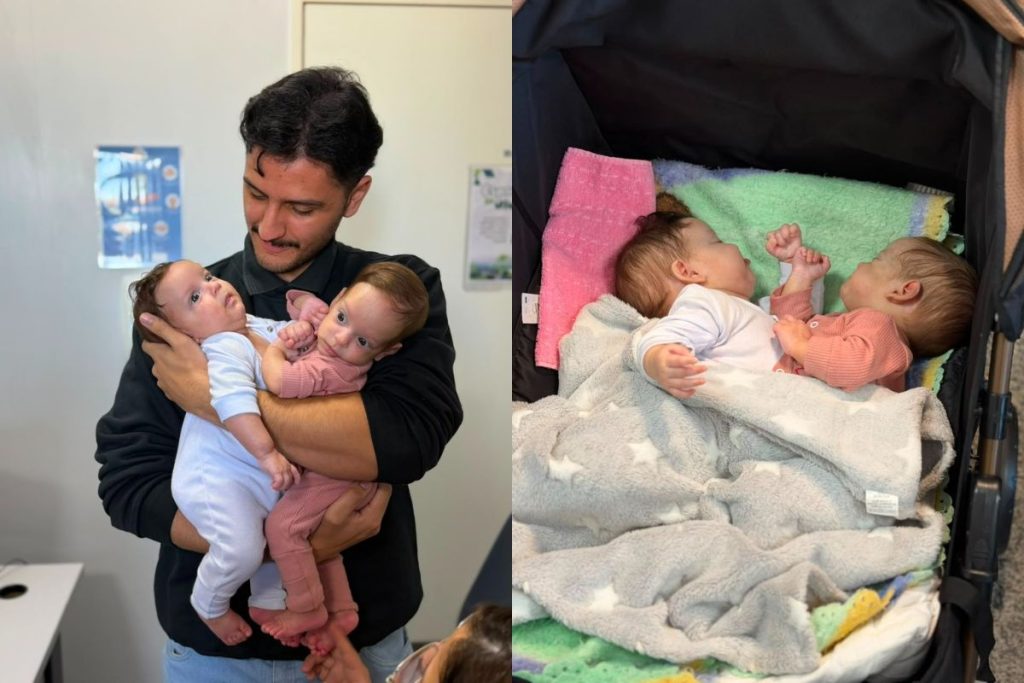 No colo do pai e no carrinho, as gêmeas Maria Helena e Maria Eva iniciam em Goiânia a etapa preparatória para a cirurgia de separação. (Foto: Divulgação) 
