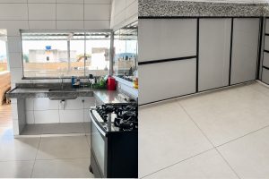 Cozinha com armários de porcelanato e estrutura de alumínio próximos à pia