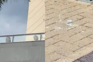 Moradora de edifício de alto padrão no Bairro Jundiaí foi flagrada arremessando ovos em direção a manifestantes que participavam de ato de apoio a Lula em Anápolis. (Foto: Reprodução)