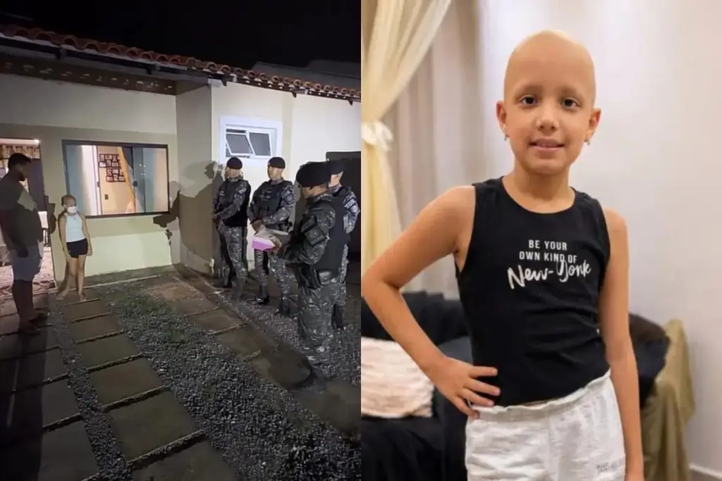 Policiais militares de Goiás durante visita a menina