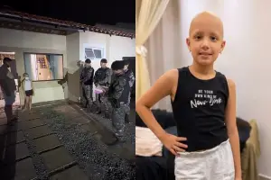 Policiais militares de Goiás durante visita a menina
